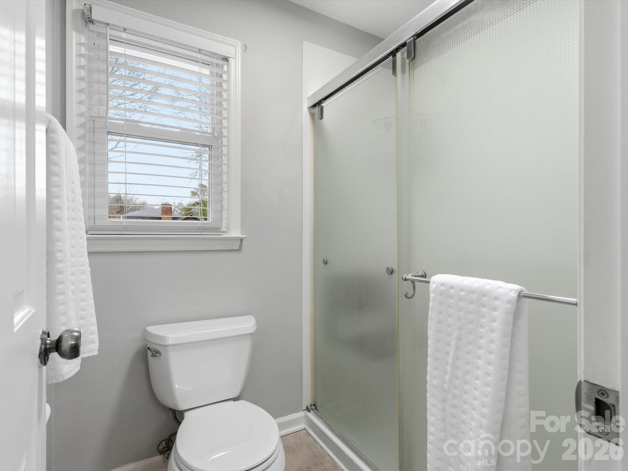 107 Friendfield Drive Fort Mill, SC 29715 - Photo 25 of 40 a bathroom with a toilet and a shower