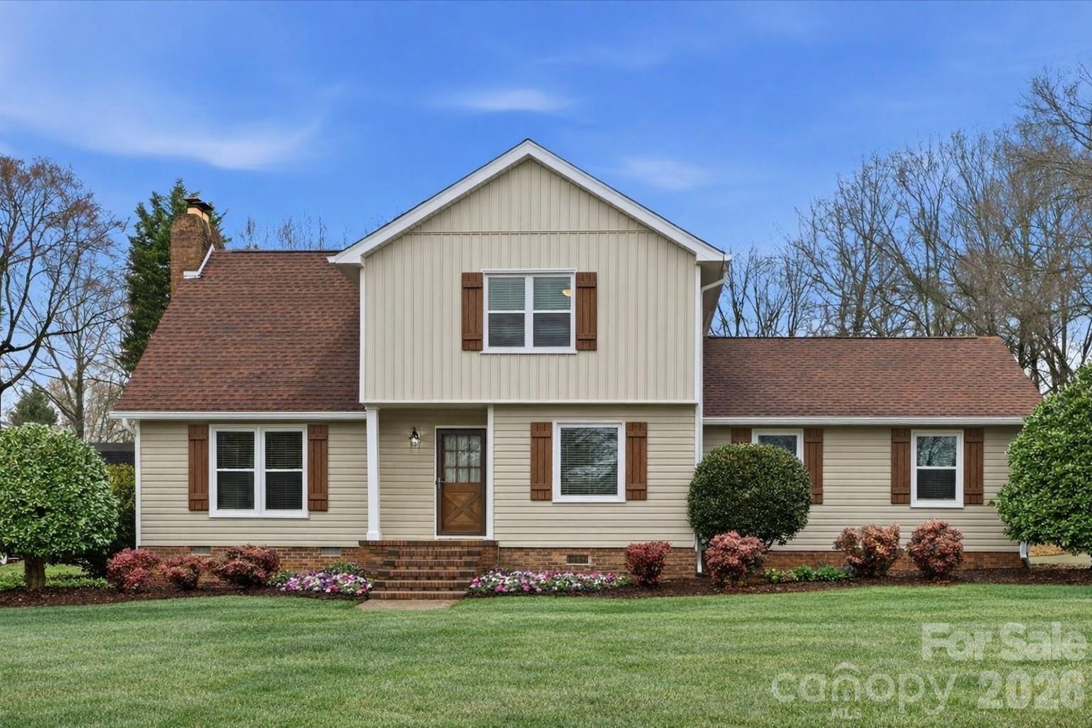 107 Friendfield Drive Fort Mill, SC 29715 - Photo 3 of 36 a front view of a house with a yard