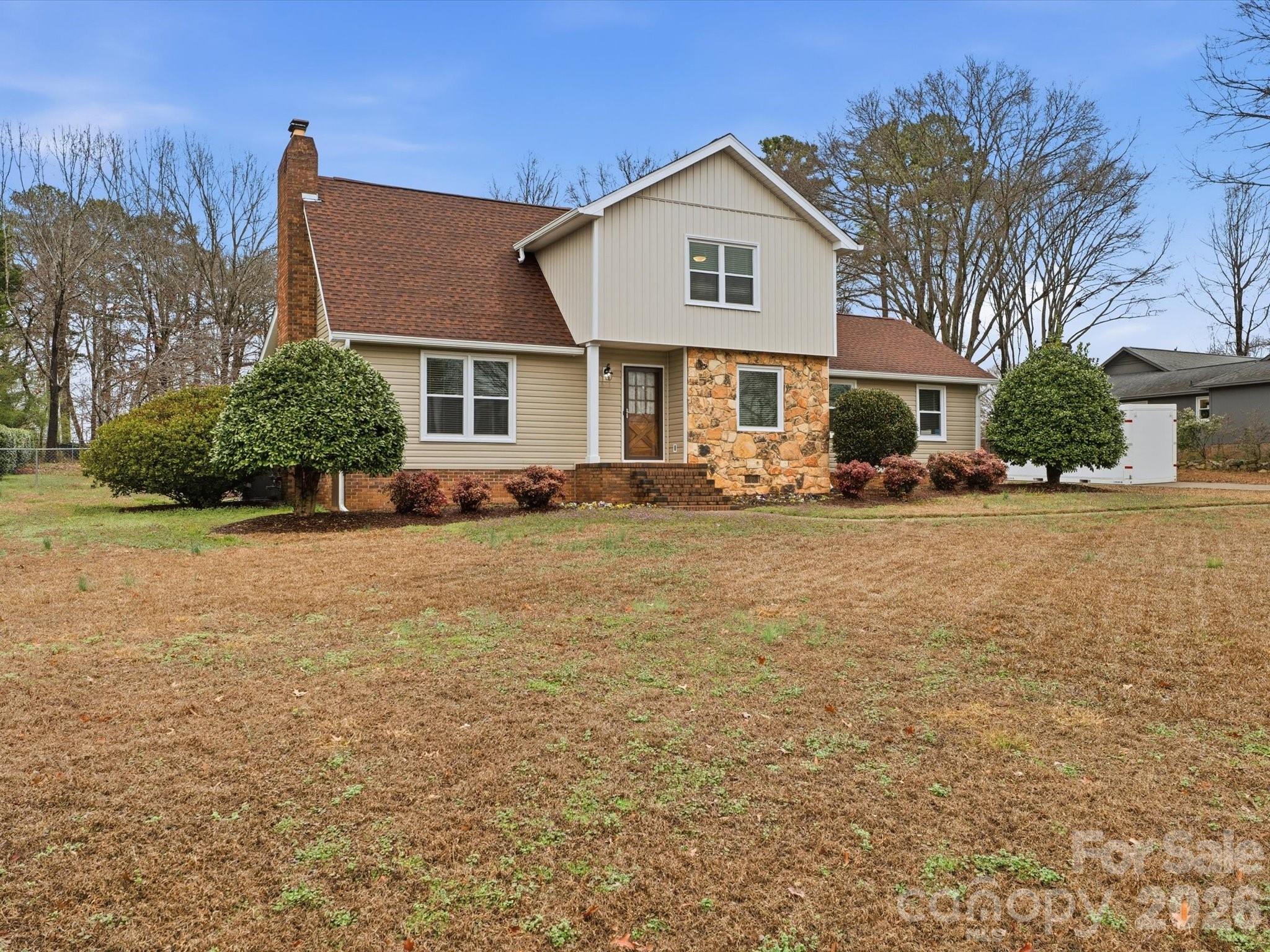 107 Friendfield Drive Fort Mill, SC 29715 - Photo 32 of 40 a front view of a house with a yard