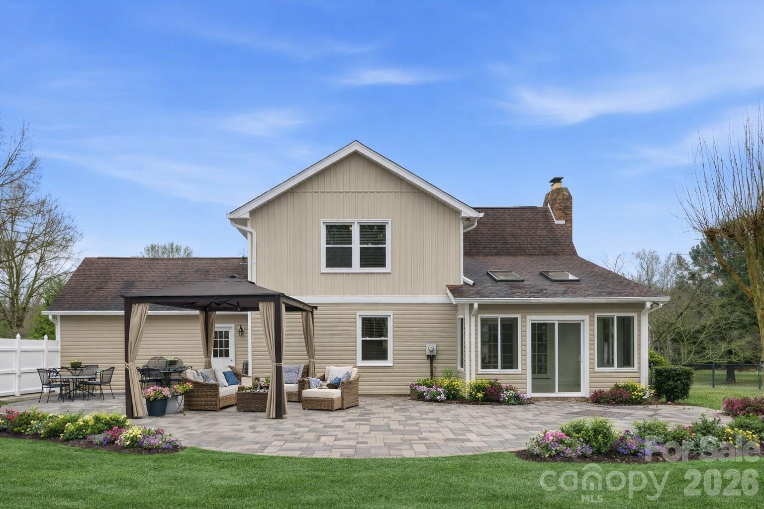 107 Friendfield Drive Fort Mill, SC 29715 - Photo 35 of 36 a front view of a house with garden