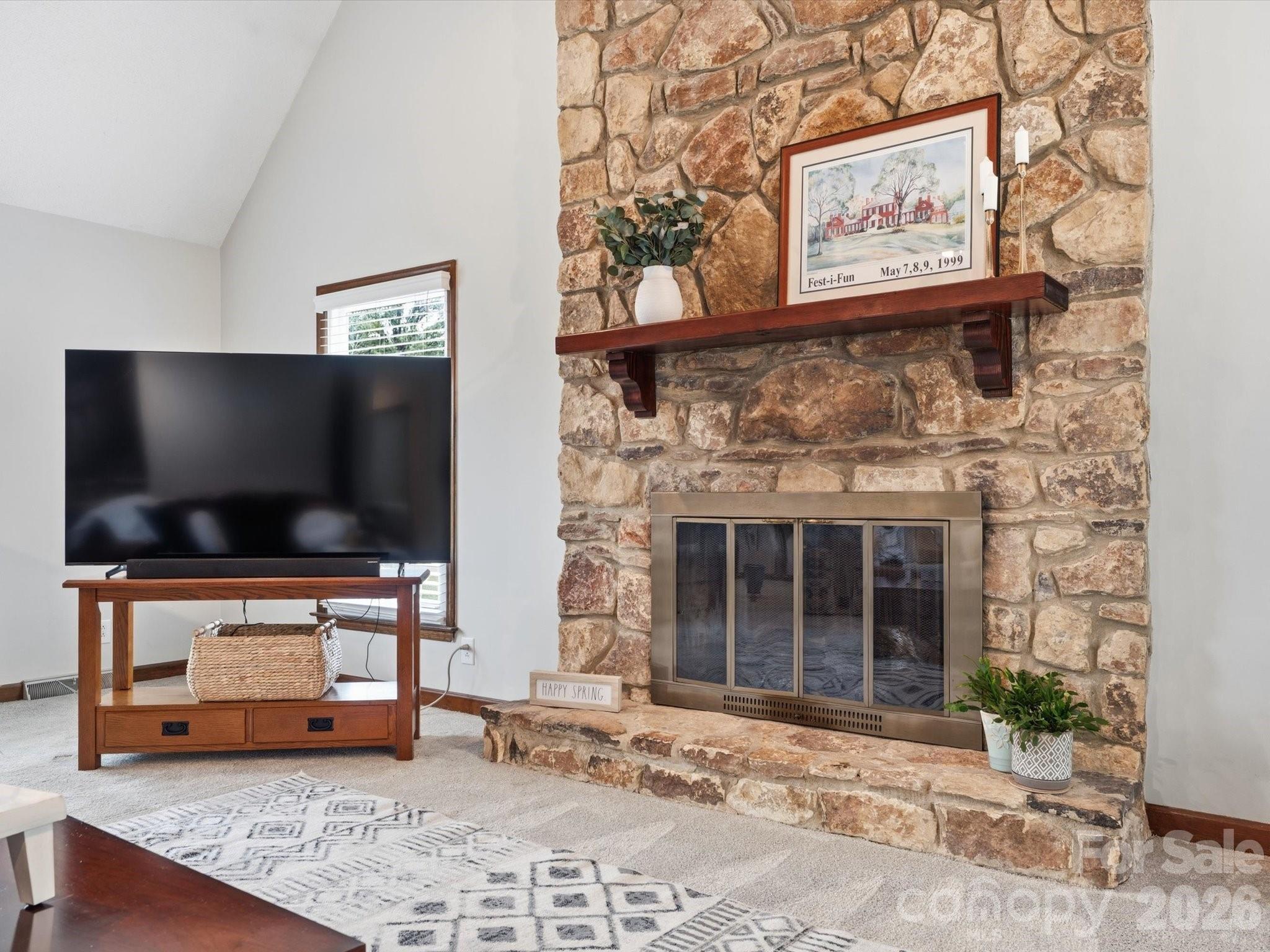 107 Friendfield Drive Fort Mill, SC 29715 - Photo 9 of 40 a living room with furniture and a flat screen tv
