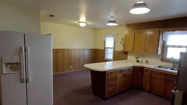 a bathroom with a sink double vanity and a mirror