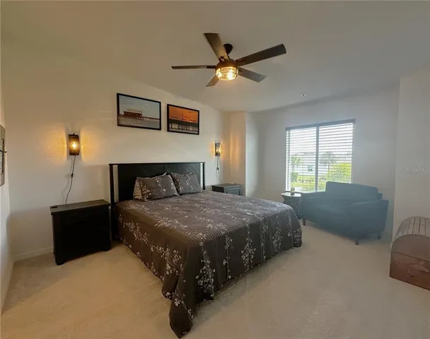 a bedroom with a bed and window