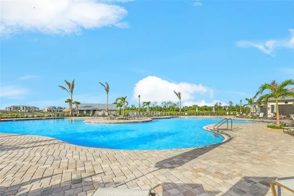 a view of a swimming pool and outdoor space