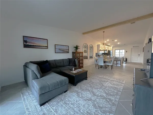 a living room with furniture and a table