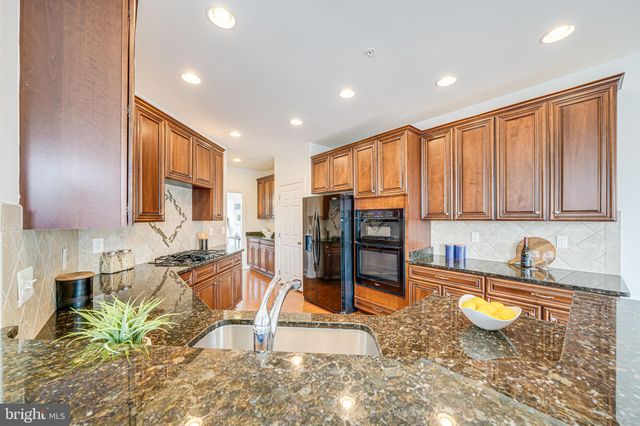 a view of balcony with furniture