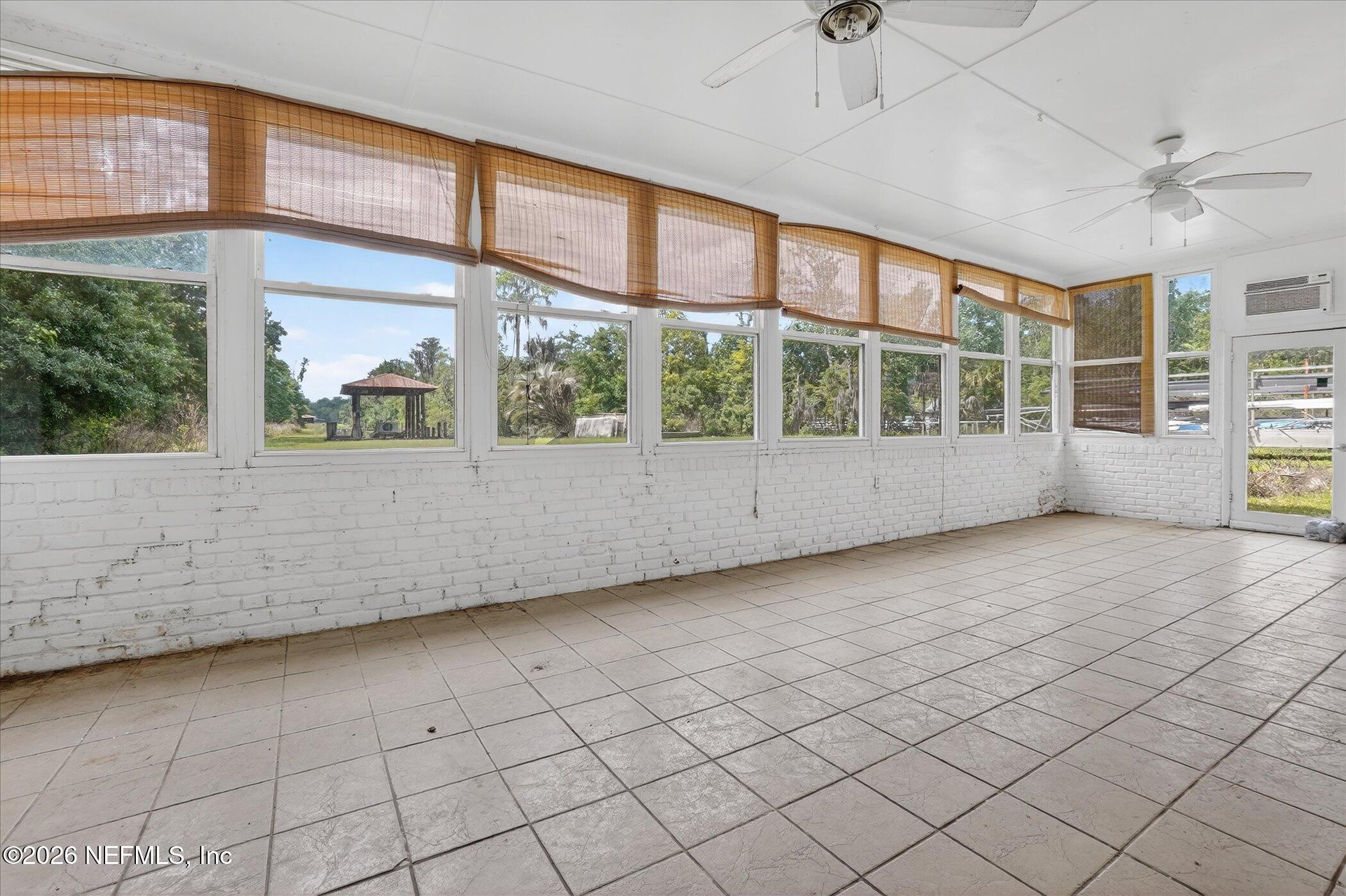 4242 Hillwood Road Jacksonville, FL 32223 - Photo 36 of 36 a view of an empty room with a window
