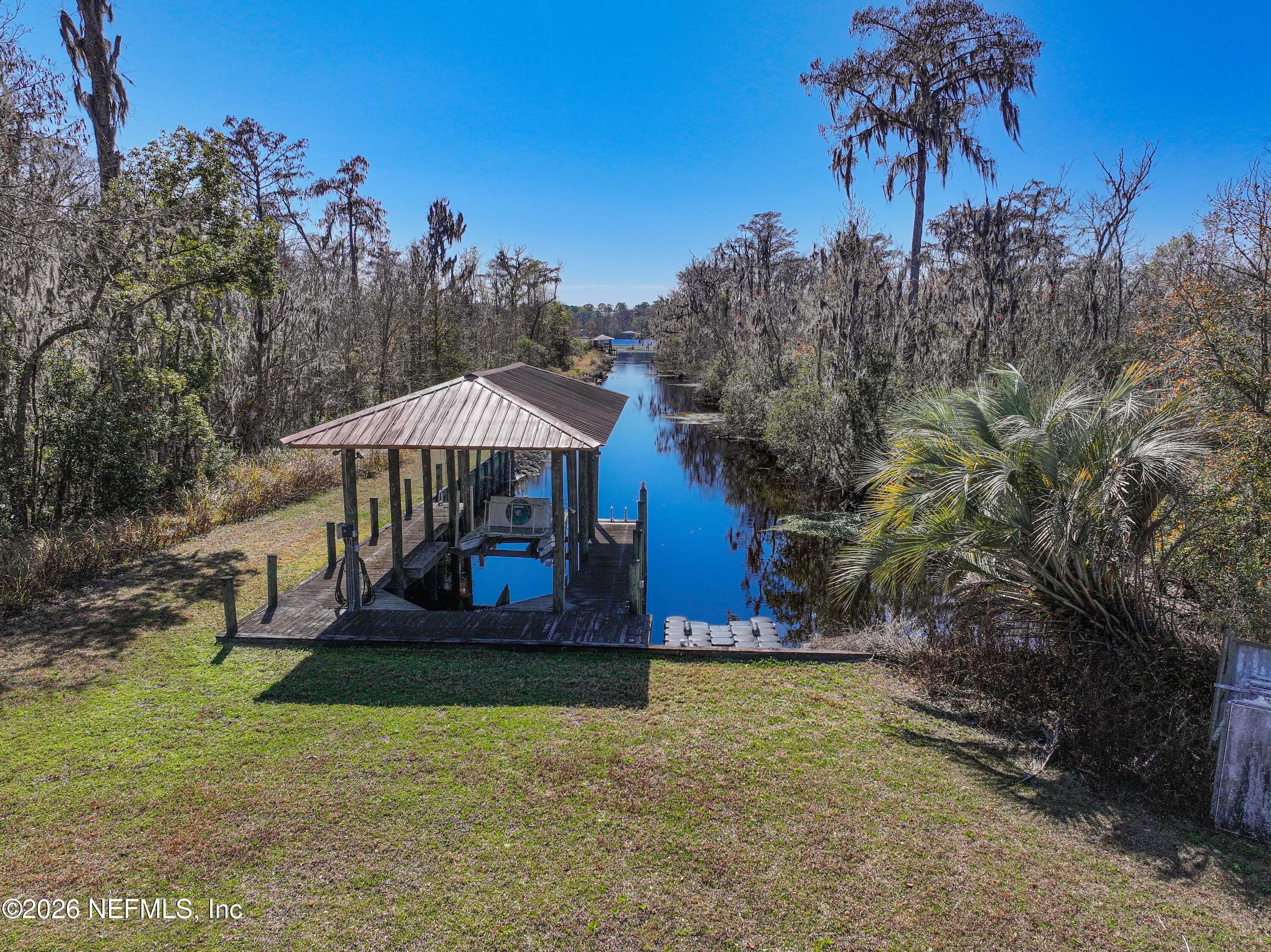 4242 Hillwood Road Jacksonville, FL 32223 - Photo 5 of 36 a house view with a garden space