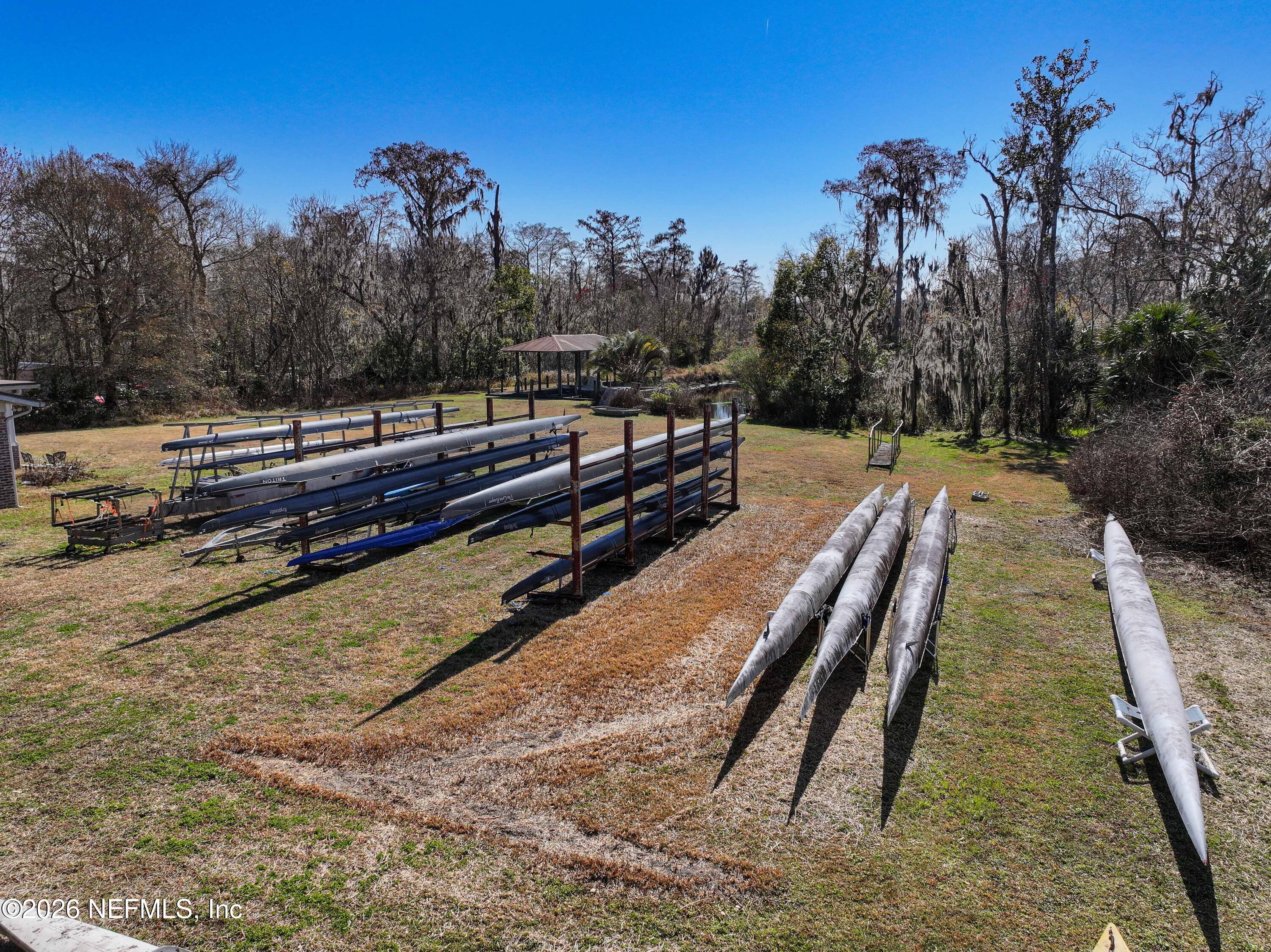 4242 Hillwood Road Jacksonville, FL 32223 - Photo 8 of 36 a view of a wooden floor with a yard