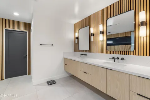 a bathroom with a bathtub and shower