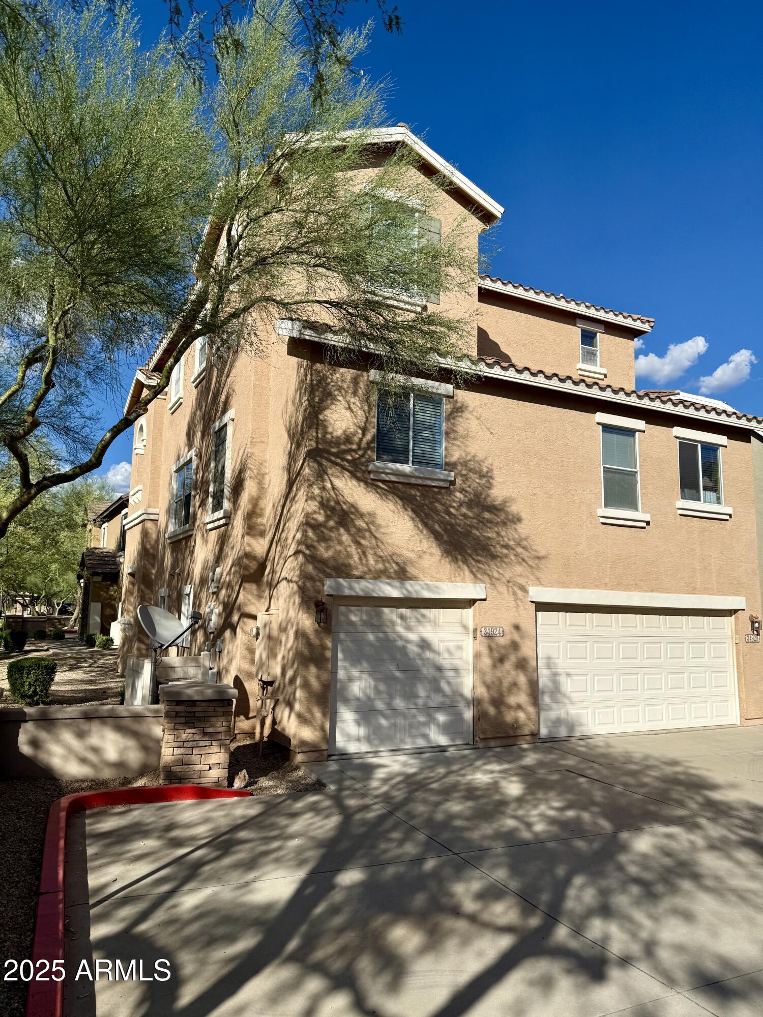 34924 North 30th Avenue Phoenix, AZ 85086 - Photo 2 of 20 a view of a yard with street