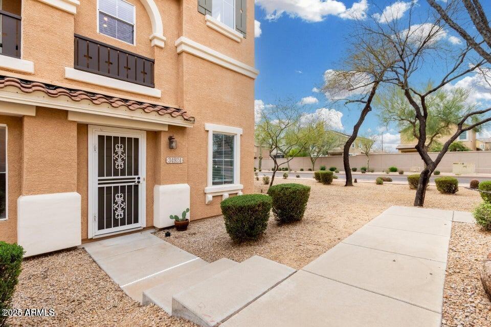 34924 North 30th Avenue Phoenix, AZ 85086 - Photo 3 of 20 a view of a building with bench