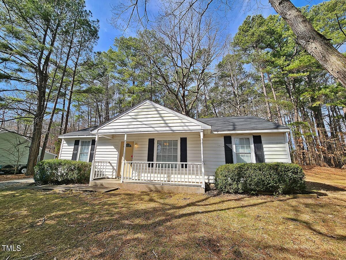 11 Howlett Place Durham, NC 27703 - Photo 2 of 27 a front view of a house with a garden