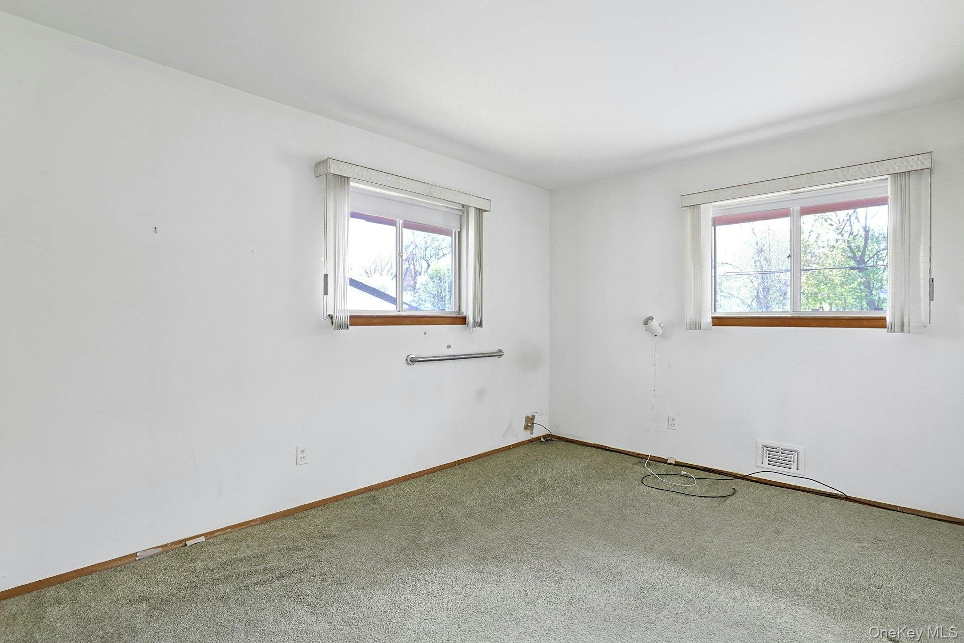 44 Southgate Drive Spring Valley, NY 10977 - Photo 14 of 24 an empty room with windows