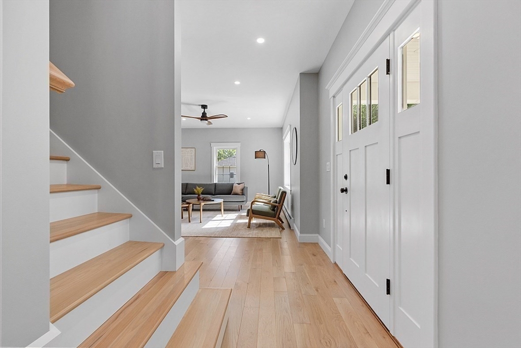 1371 South Athol Road Athol, MA 01331 - Photo 20 of 39 a view of a hallway with wooden floor and staircase