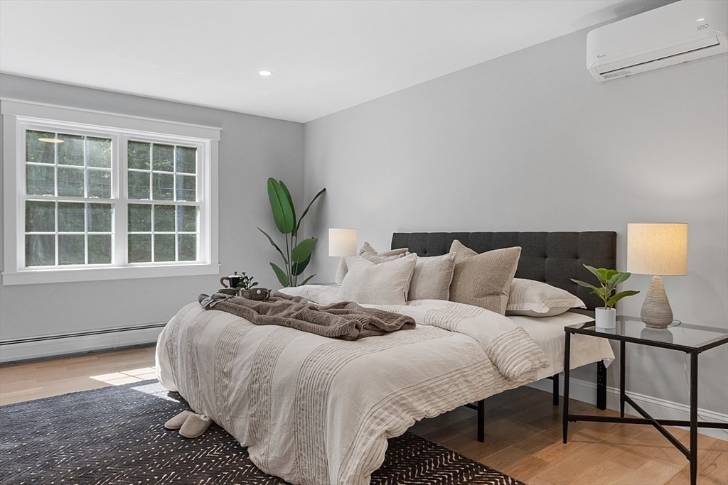 1371 South Athol Road Athol, MA 01331 - Photo 22 of 39 a bed sitting in a bedroom next to a window