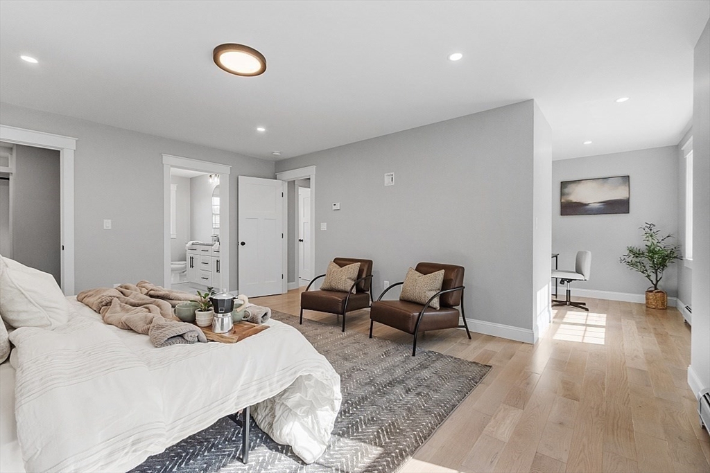 1371 South Athol Road Athol, MA 01331 - Photo 23 of 39 a bedroom with furniture and a wooden floor
