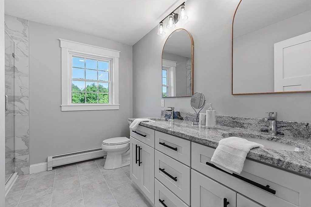 1371 South Athol Road Athol, MA 01331 - Photo 25 of 39 a bathroom with a granite countertop sink mirror and toilet