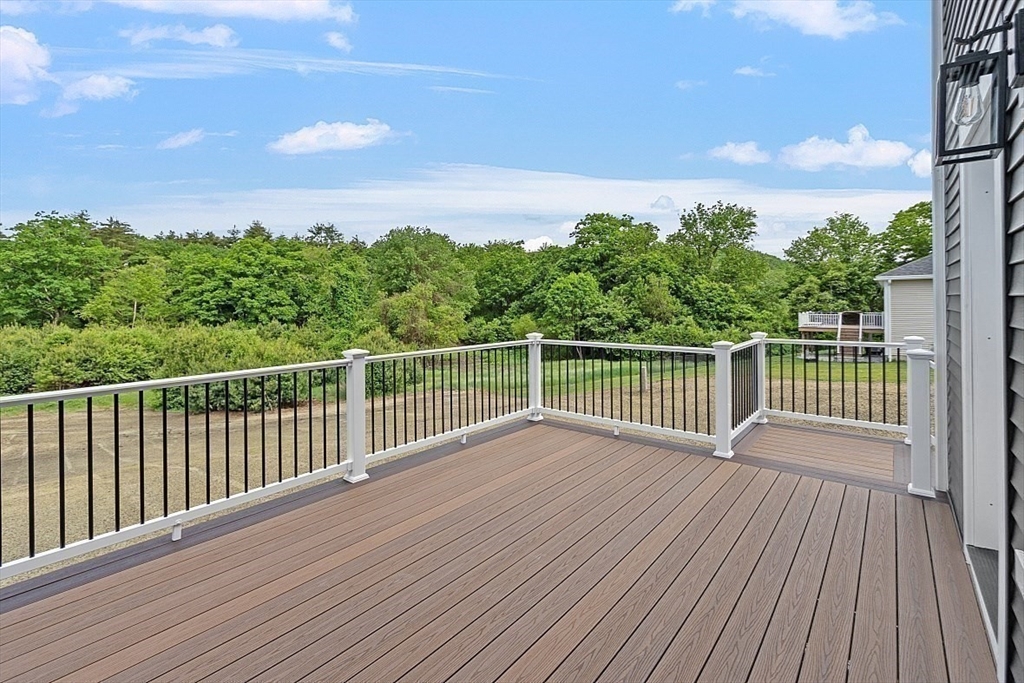 1371 South Athol Road Athol, MA 01331 - Photo 36 of 39 a view of a deck with wooden floor and fence