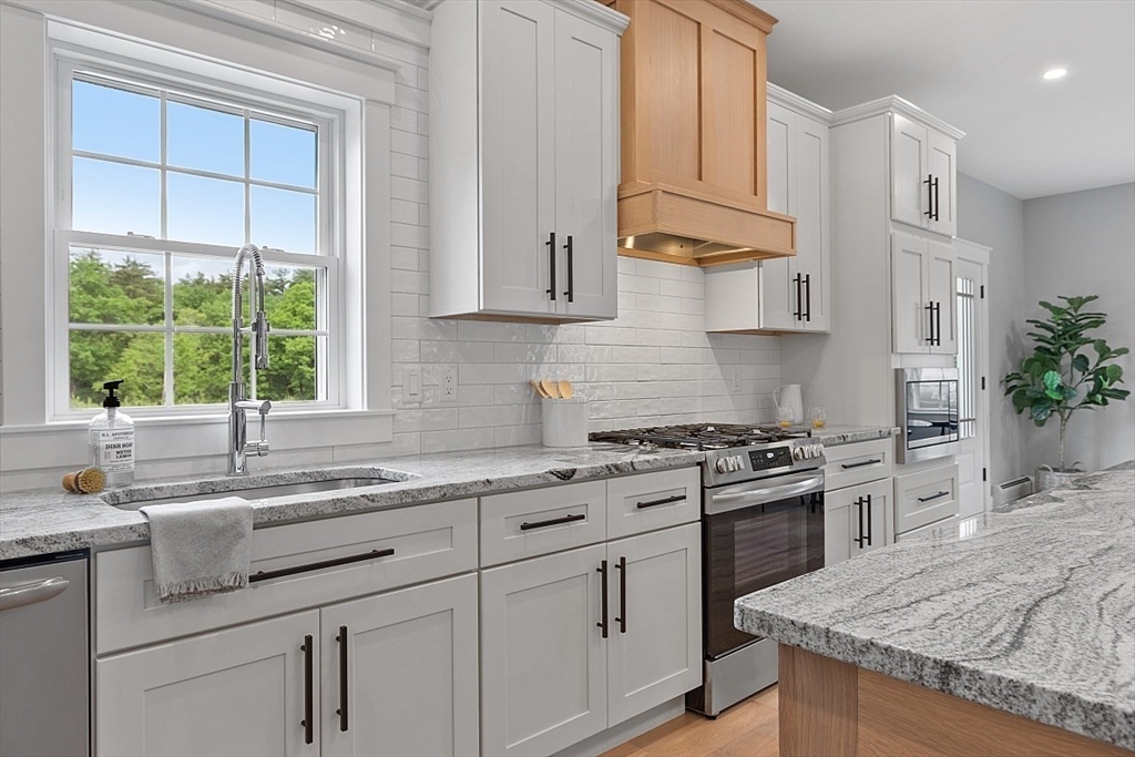 1371 South Athol Road Athol, MA 01331 - Photo 7 of 39 a kitchen with stainless steel appliances granite countertop a sink stove and cabinets