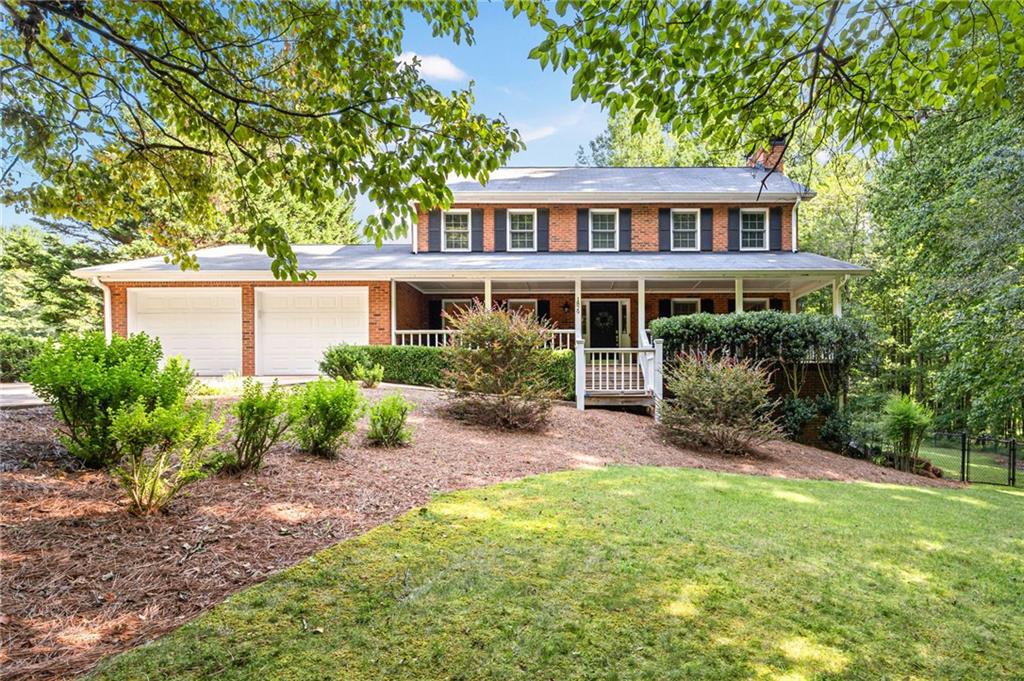 Welcome home to this charming 4 sided brick residence nestled on a peaceful 10.8 acres.