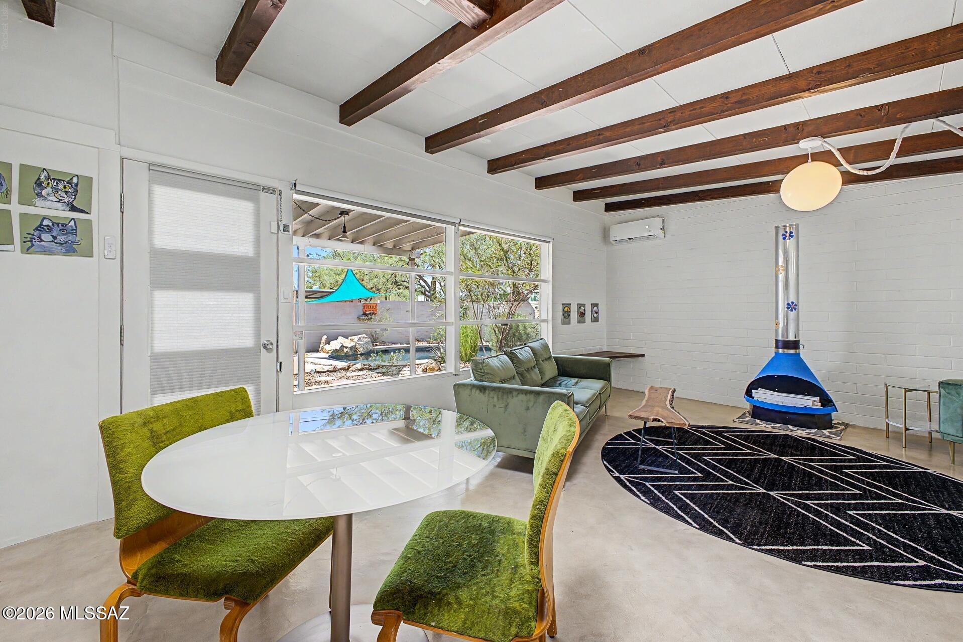 1909 North Ridgeway Road Tucson, AZ 85712 - Photo 7 of 41 Dining & living room overlooking the backyard and pool