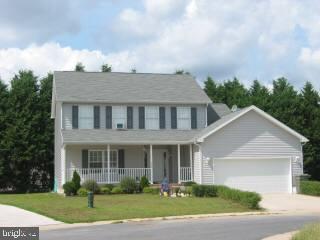 802 Meadow Point Court Salisbury, MD 21801 - Photo 1 of 1 a front view of a house with garden