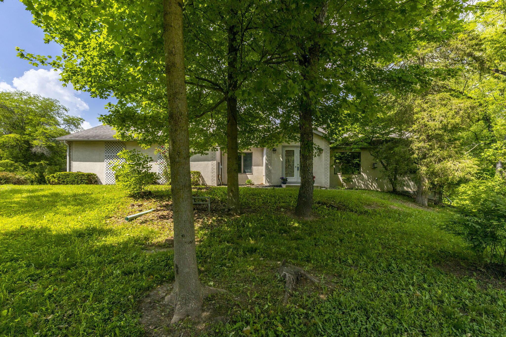 8945 Cheshire Road Sunbury, OH 43074 - Photo 2 of 56 Nestled in Trees