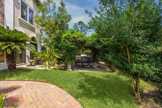 a view of a backyard with a garden