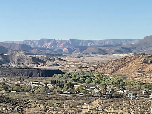 16 New Venture Road, Unit 16 P AND H Clarkdale, AZ 86324 - Photo 6 of 18 a view of a large building with a mountain in the background