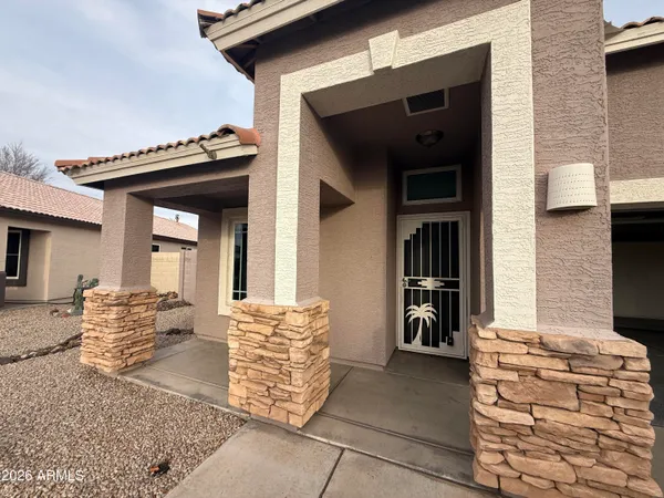 a front view of a house with parking