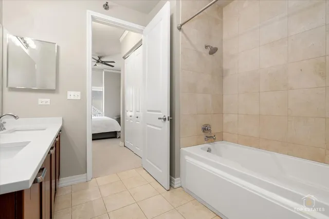 a bedroom with a bed chair and window