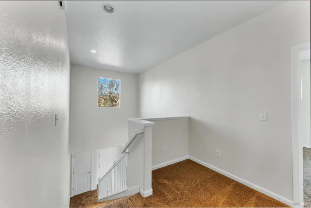a view of hallway with stairs