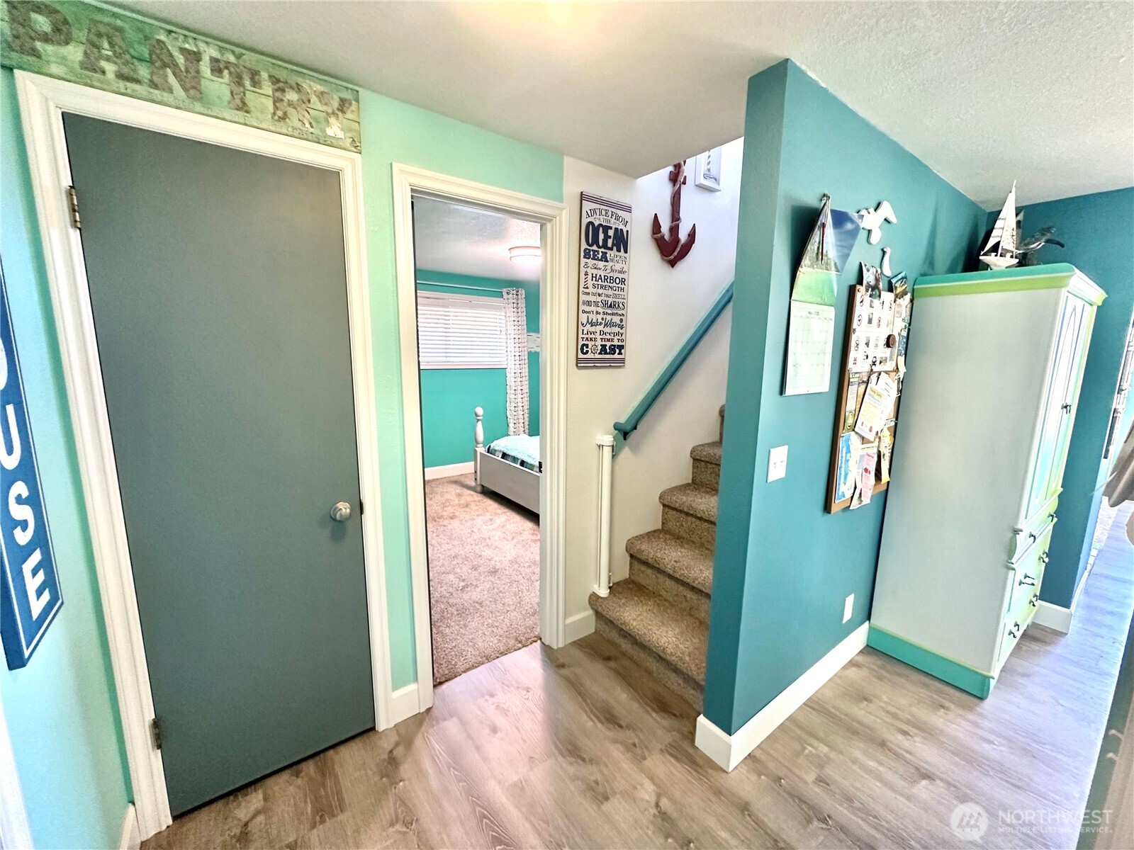 15217 Pacific Way Long Beach, WA 98631 - Photo 14 of 40 a view of entryway and hallway with wooden floor