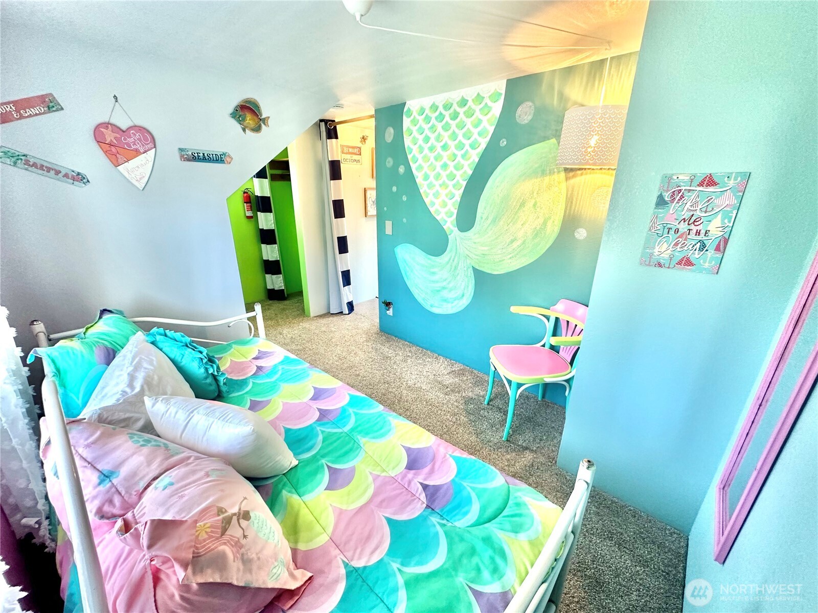 15217 Pacific Way Long Beach, WA 98631 - Photo 24 of 40 a bedroom with two beds and a bed