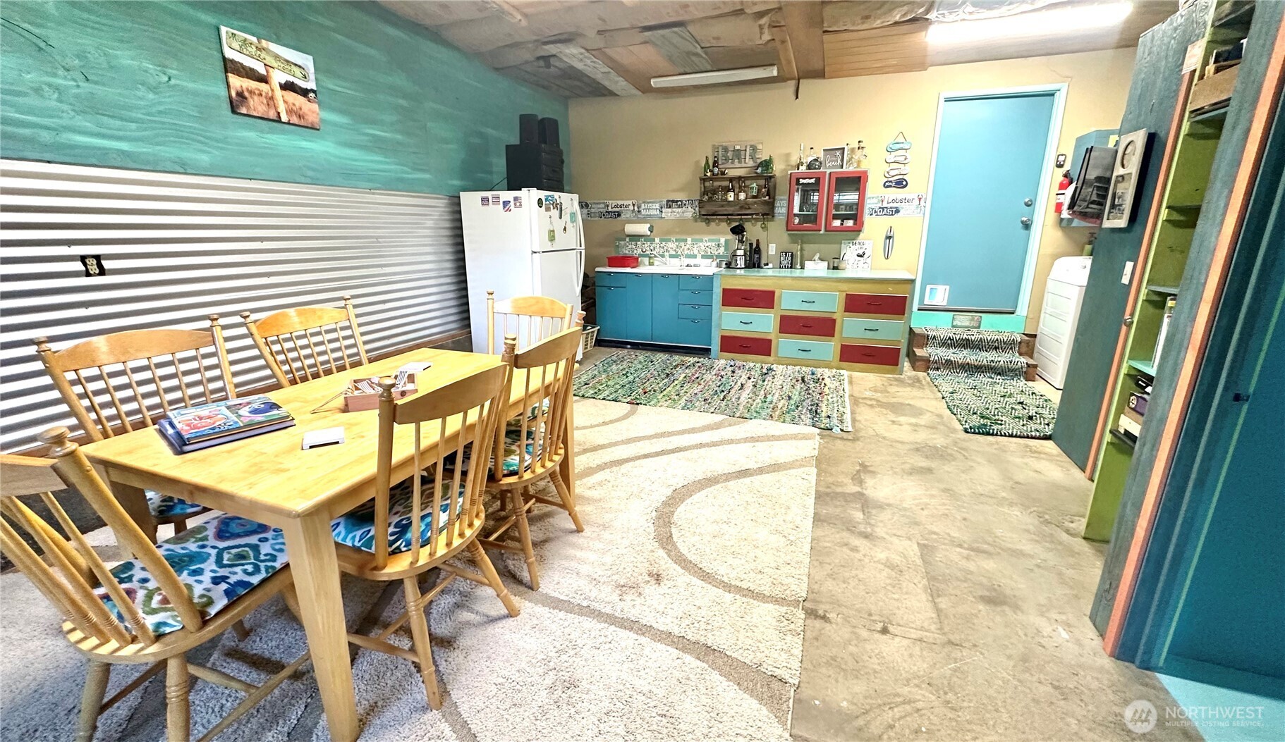 15217 Pacific Way Long Beach, WA 98631 - Photo 27 of 40 a dining room with furniture and a window
