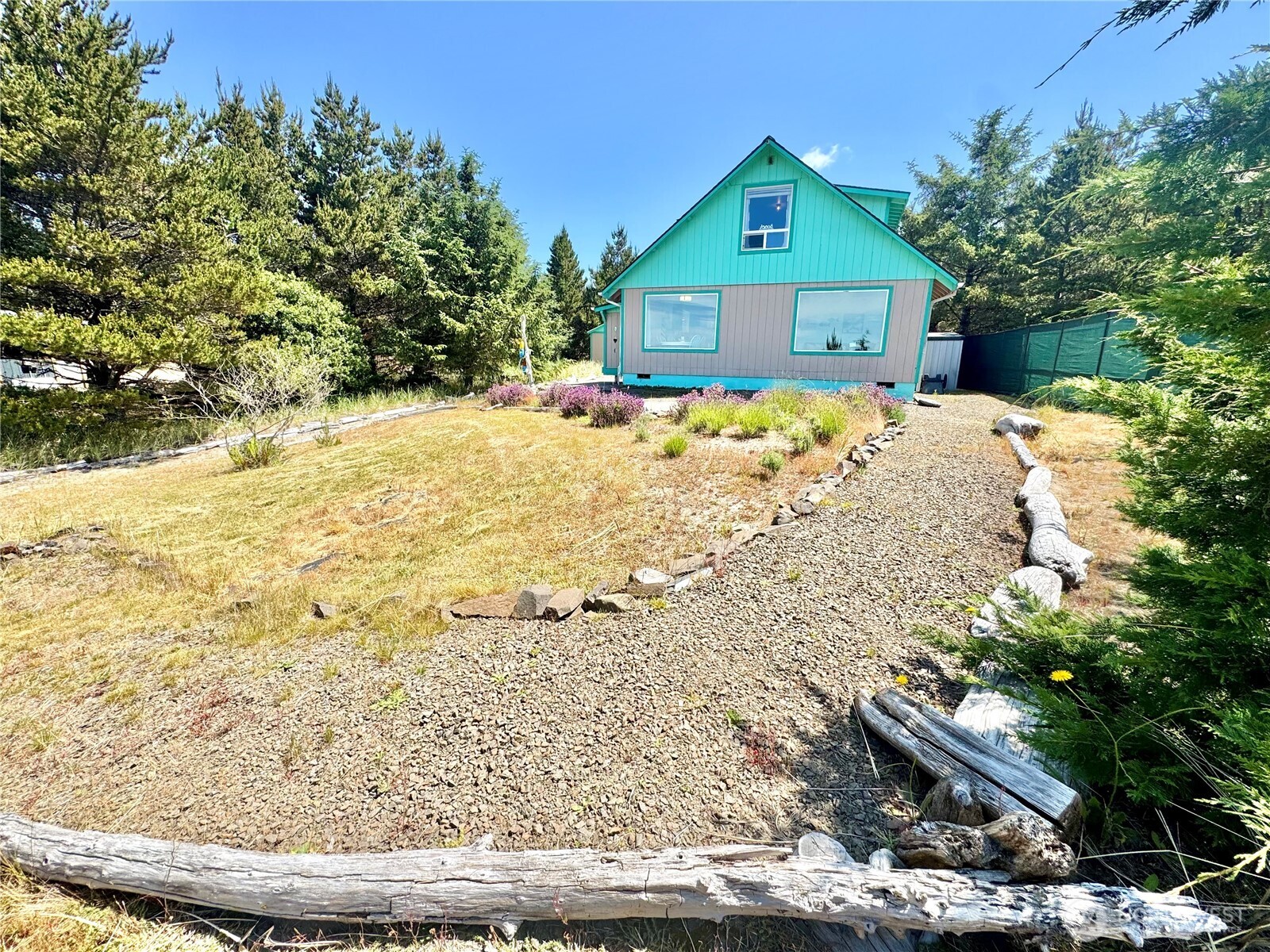 15217 Pacific Way Long Beach, WA 98631 - Photo 35 of 40 a front view of a house with a yard