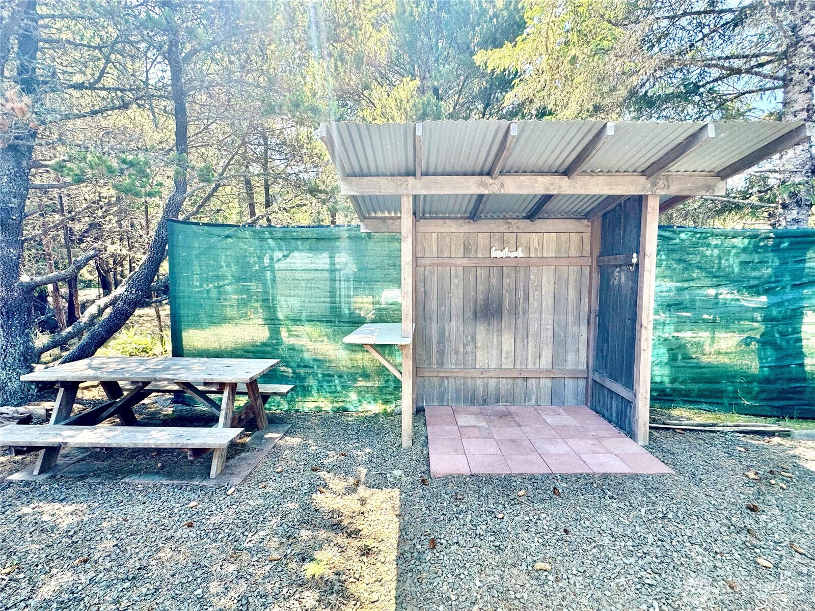 15217 Pacific Way Long Beach, WA 98631 - Photo 39 of 40 a backyard of a house with yard and outdoor seating
