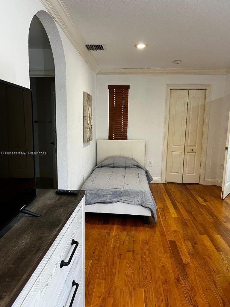 1411 Normandy Drive Miami Beach, FL 33141 - Photo 18 of 23 a kitchen with granite countertop sink and granite counter top