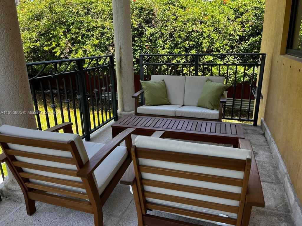 1411 Normandy Drive Miami Beach, FL 33141 - Photo 21 of 23 a view of outdoor space with seating