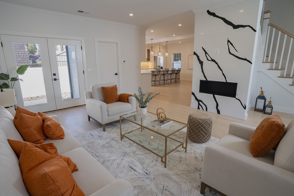 24 Palmetto Street Saugus, MA 01906 - Photo 11 of 37 a living room with furniture and white walls