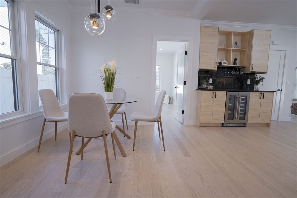 24 Palmetto Street Saugus, MA 01906 - Photo 15 of 37 a view of a dining room with furniture and wooden floor