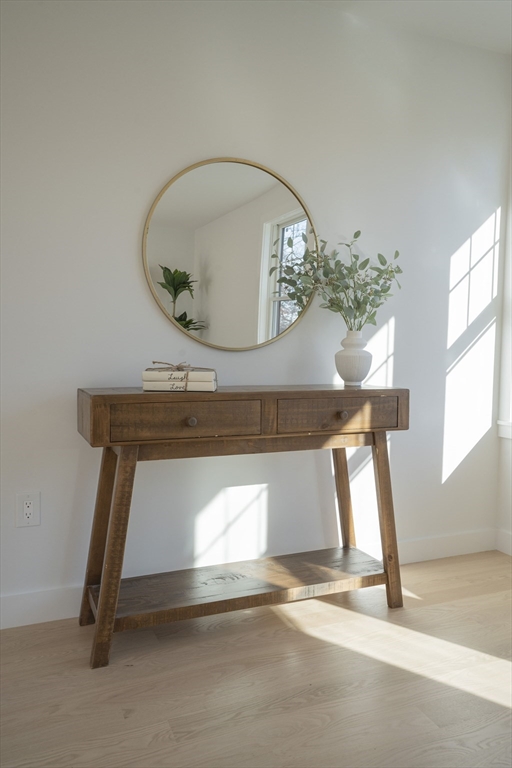 24 Palmetto Street Saugus, MA 01906 - Photo 23 of 37 a room with a mirror