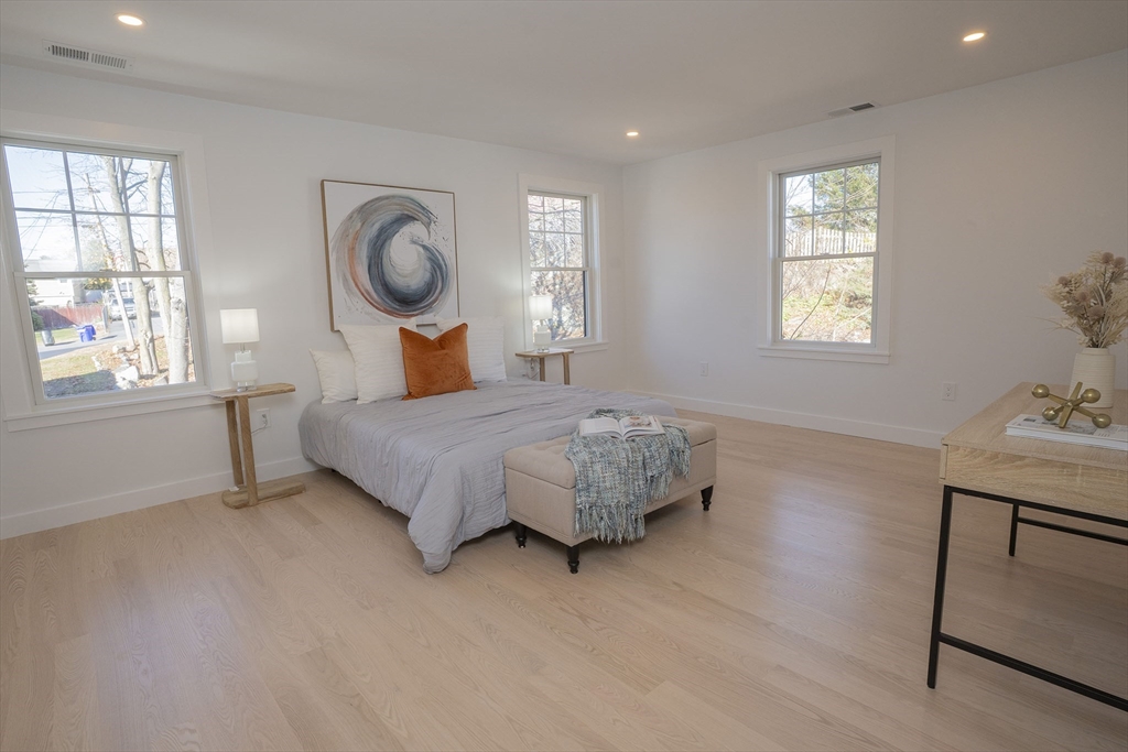 24 Palmetto Street Saugus, MA 01906 - Photo 32 of 37 a bedroom with bed and window