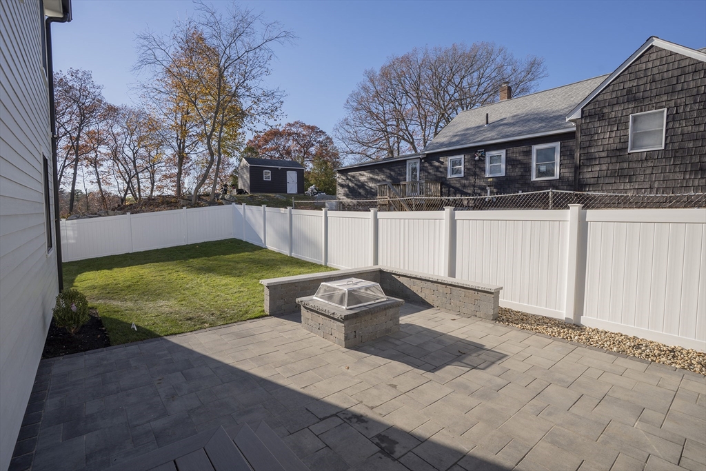24 Palmetto Street Saugus, MA 01906 - Photo 6 of 37 a view of a house with backyard