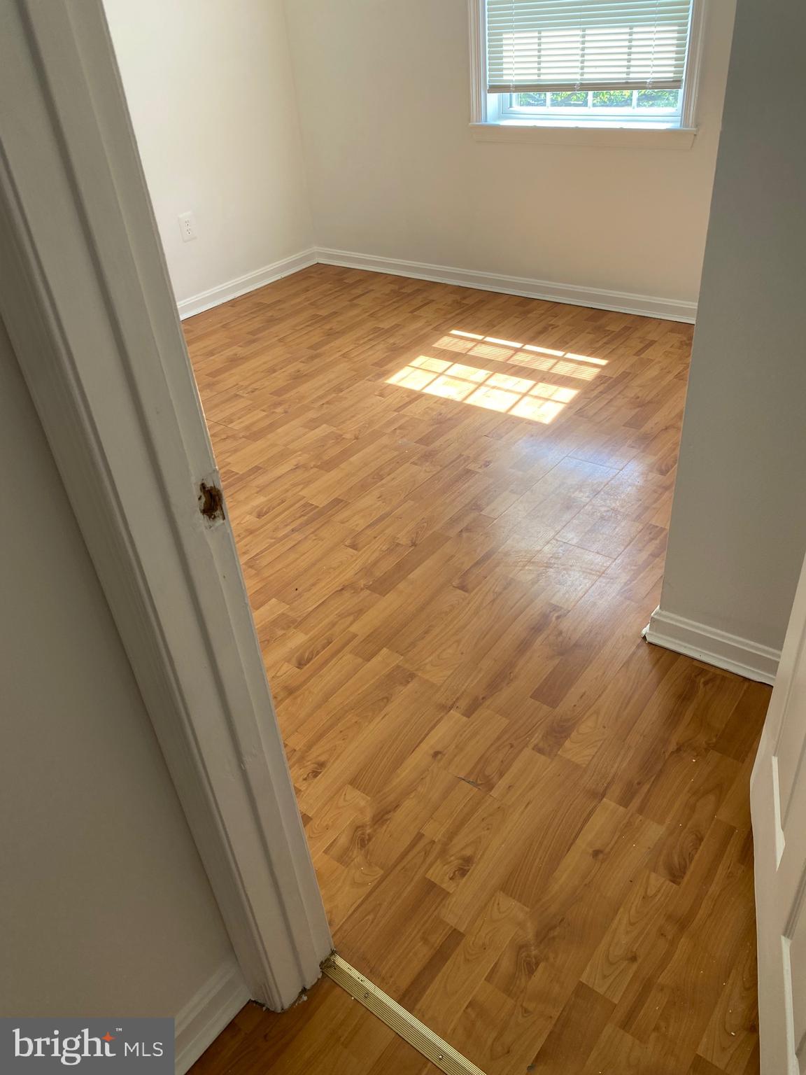 9717 Whiskey Run Laurel, MD 20723 - Photo 11 of 31 a view of empty room with window