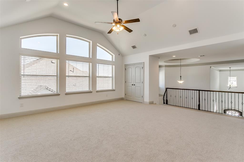 1636 Prairie Ridge Road Fort Worth, TX 76008 - Photo 12 of 14 a view of an empty room with a window