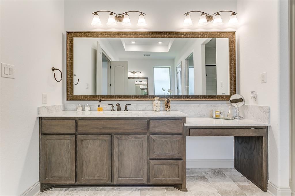 1636 Prairie Ridge Road Fort Worth, TX 76008 - Photo 10 of 14 a bathroom with a double vanity sink and a mirror