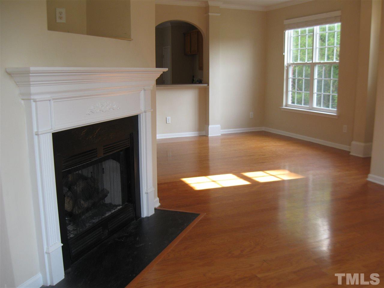 7677 Winners Edge Street Raleigh, NC 27617 - Photo 3 of 25 Open area to living room and dining room.