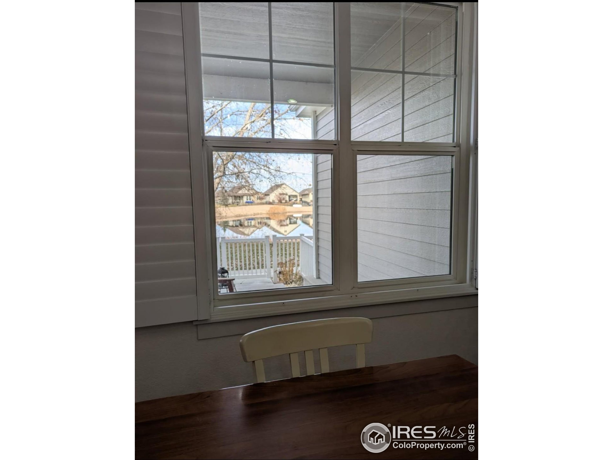 2172 Cape Hatteras Drive, Unit 2 Windsor, CO 80550 - Photo 13 of 46 a view of a window in a room
